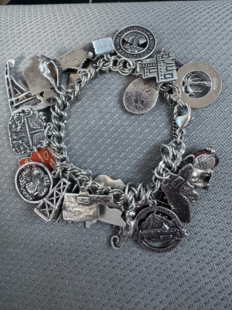 Avery Sterling Silver Multicharm Bracelet With Travel And Crest Charms